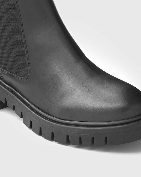 Adorly classic patent chelsea boots