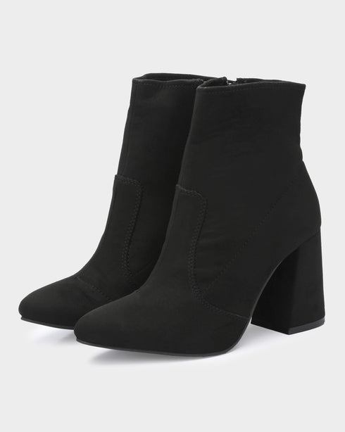 Adorly Flared block heel boots
