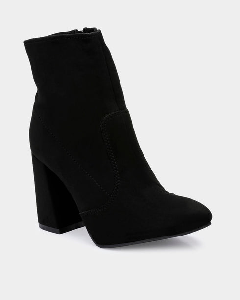Adorly Flared block heel boots