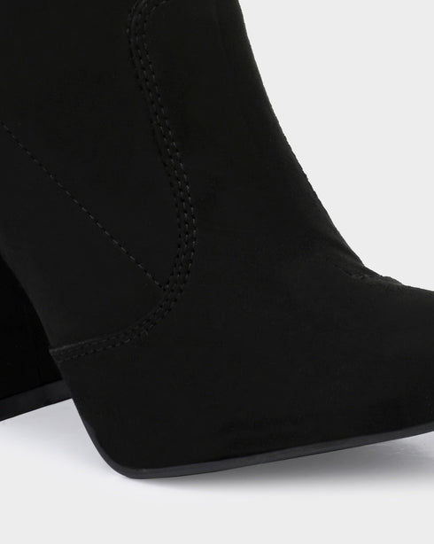 Adorly Flared block heel boots